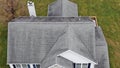 Aerial Residential Roof and Chimney Inspection by Drone, Entire Roofline and House Royalty Free Stock Photo