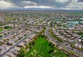 Aerial roofs of the many small ponds near a Avondale town houses in the urban landscape of a small sleeping area Phoenix Arizona