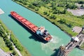 Aerial scene of a Lake Freighter travelling in the Welland Canal, Canada