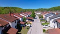 AERIAL: Scenic aerial view of an idyllic suburban neighborhood near Ljubljana. Royalty Free Stock Photo