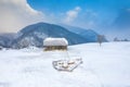 Aerial scenic rural view over Pestera village at the bottom of Piatra-Craiului Mountains during a freezing winter in Romania with Royalty Free Stock Photo