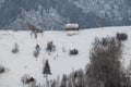 Aerial scenic rural view over Pestera village at the bottom of Piatra-Craiului Mountains during a freezing winter in Romania with Royalty Free Stock Photo
