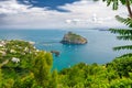 Aerial scenic view on Aragonese castle through foliage, Ischia, Italy