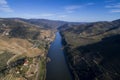 Aerial scenic view of the Douro River and Valley with terraced vineyards along the banks of the river Royalty Free Stock Photo