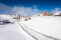 Aerial scenic rural view of Sirnea village at the bottom of Piatra-Craiului Mountains in freezing winter landscape from Romania Royalty Free Stock Photo