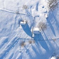 Aerial scenic rural view of the winter landscape from Fundata village in Romania at the bottom of Bucegi Mountains Royalty Free Stock Photo