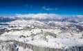 Aerial scenic rural view of the winter landscape from Fundata village in Romania at the bottom of Bucegi Mountains Royalty Free Stock Photo