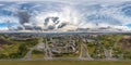 aerial seamless spherical 360 hdri panorama view above road junction with traffic in city overlooking of residential area in