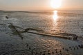 Aerial from a shipwreck at the Wadden Sea in the Netherlands at sunset Royalty Free Stock Photo