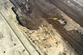 Aerial shoot of quarry with heavy bucket wheel excavators mining a coal. Heavy industry concept.