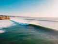 Aerial shooting of big stormy waves at sunset. Biggest ocean wave in Bali Royalty Free Stock Photo