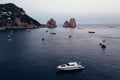 Aerial shooting from drone boat and yacht standing in parking in the sea in Italy