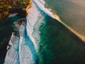 Aerial shooting of storm waves at sunset. Ocean waves in Bali Royalty Free Stock Photo