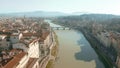 Aerial shot of the Arno river and cityscape of Florence, Italy