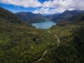 Aerial shot of Balinsasayao Twin Lakes, Negros Oriental, Philippines surrounded by lush green forest