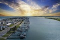 aerial shot of Banks Channel with vast blue ocean water and lush green plants and trees, homes and boats docked Royalty Free Stock Photo