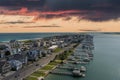 aerial shot of Banks Channel with vast blue ocean water and lush green plants and trees, homes and boats docked Royalty Free Stock Photo