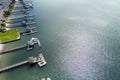 aerial shot of Banks Channel with vast blue ocean water and lush green plants and trees, homes and boats docked Royalty Free Stock Photo