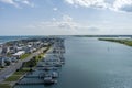 aerial shot of Banks Channel with vast blue ocean water and lush green plants and trees, homes and boats docked Royalty Free Stock Photo