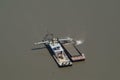 Aerial shot of a barge in Missouri river dredging sand