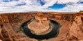 Aerial shot of the beautiful Horseshoe Bend in Arizona under the blue cloudy sky on a sunny day Royalty Free Stock Photo