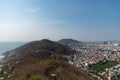 Aerial shot of a beautiful mountain coast bordering the city of Vung Tau, Vietnam Royalty Free Stock Photo