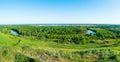 Aerial shot of the beautiful russian river among the green hills in Krasnodarsky kray, Russia, Kuban river.