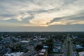 aerial shot of beautiful summer landscape with homes, apartments and condos, cars on the street and lush green trees and grass Royalty Free Stock Photo