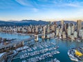 Aerial shot of the beautiful Vancouver city in Canada with many skyscrapers during the winter