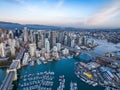 Aerial shot of the beautiful Vancouver city in Canada with many skyscrapers during the winter