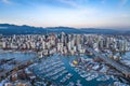 Aerial shot of the beautiful Vancouver city in Canada with many skyscrapers during the winter