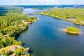 Aerial shot of Belews Lake in North Carolina, USA with a small island, houses, powerplant