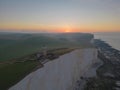 Aerial shot of the Belle Tout Lighthouse in Beachy Head, East Sussex, England during sunrise Royalty Free Stock Photo