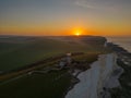 Aerial shot of the Belle Tout Lighthouse in Beachy Head, East Sussex, England during sunrise Royalty Free Stock Photo
