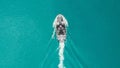 Aerial shot of a boat in a lake in Cambridge, United Kingdom.