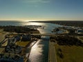 Aerial shot of a bridge over the waters in Hampton Bays, New York on a sunny day