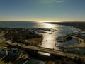 Aerial shot of a bridge over the waters in Hampton Bays, New York on a sunny day