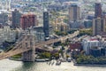 Aerial Shot of Brooklyn Bridge and Manhattan Bridge with Skyscrapers and East River in Background