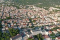 Aerial shot of buildings near the forested mountain at daytime in Makarska, Croatia Royalty Free Stock Photo