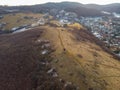 Aerial shot of the Bukk Mountains in winter, dense hilly landscape, Bukk National Park at sunrise