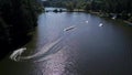 Aerial shot of a cableway in a lake with a wakeboarder