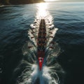 Aerial shot capturing rowers in the sea, displaying synchronized perfection