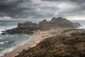 Aerial shot of Castro of Barona ruins in Galicia, Spain under the cloudy sky