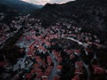 Aerial shot of the city with historical houses among the mountains Goynuk, Turkey