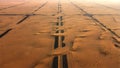 Long beautiful Dubai roads covered in sand at golden hour.