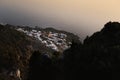 Aerial shot of the coastal village of Praiano with the church of San Gennaro during sunset Royalty Free Stock Photo