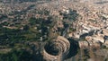 Aerial shot of Colosseum or Coliseum amphitheatre within cityscape of Rome, Italy Royalty Free Stock Photo