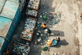 Aerial shot of a community recycling program in action, with residents sorting recyclables and waste Royalty Free Stock Photo