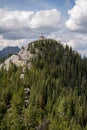 Aerial shot of the cosmic ray station of the sulphur mountain in Canada under cloudy s Royalty Free Stock Photo