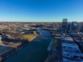 Aerial shot Cumberland River with bridges over the water surrounded by office building and bare winter trees Royalty Free Stock Photo